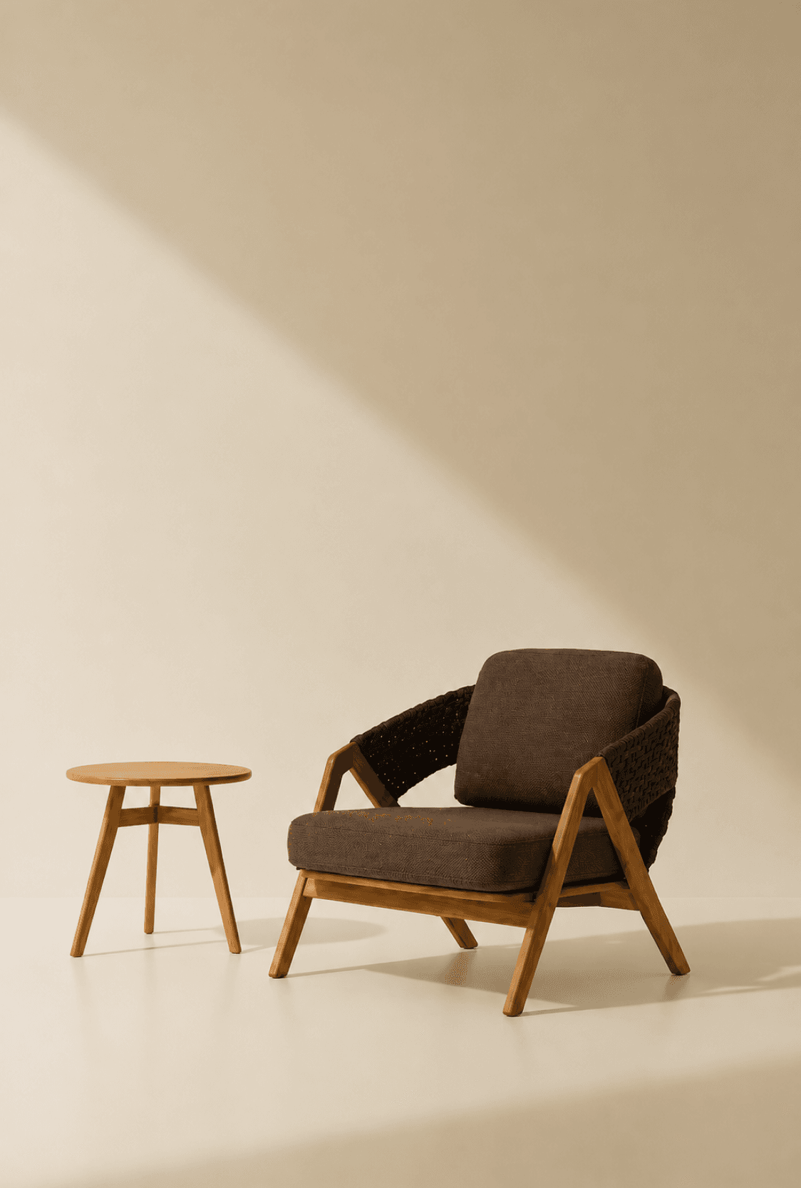 Minimal studio seating area with wooden chair and side table