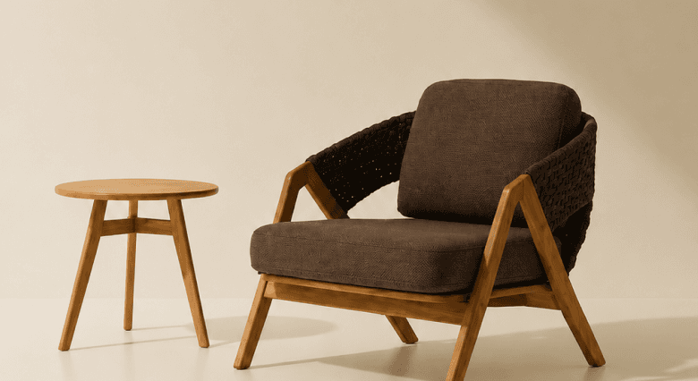 Modern wooden armchair and side table in a bright studio